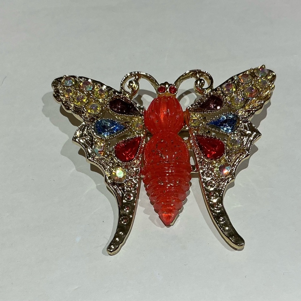 Vintage unsigned Butterfly Brooch with Multicolor Rhinestone and redLucite Body